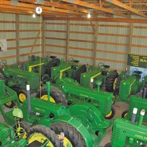 Gordon Gilchrist’s antique John Deere collection packs two Quonsets on his farm near Wainwright.