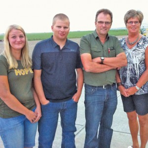 Jan and Ida Bennen, pictured with son Jacob and daughter-in-law Alicia, have hosted the pig roast for nine years.