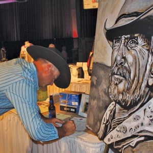 Three-time Canadian bareback riding champion Davey Shields was one of the celebrity golfers — and the successful bidder for this painting by songwriter Buddy Owens of “Lonesome Dove” actor Robert Duvall.