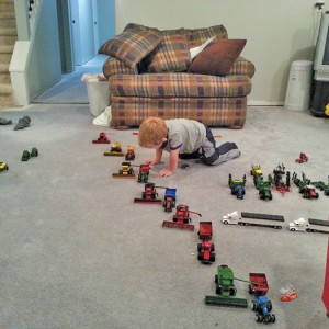 The only harvesting at Brandon Gibb’s farm near Hillspring on Sept. 10 was taking place on the carpet and being conducted by his 2-1/2-year-old son.