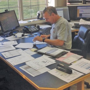 man sitting at office desk