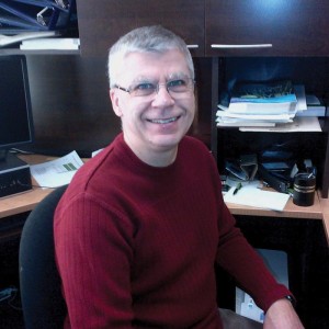 man sitting at a desk