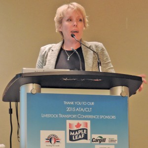Jennifer Woods speaking at a conference