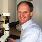 Roy Golsteyn at microscope