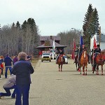 Parade escorting train museum into town