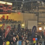 people gathered in a hockey rink