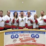 Councillors in hockey jerseys.