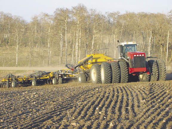 Tractor seeding in a field