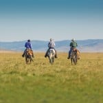 three men on horseback