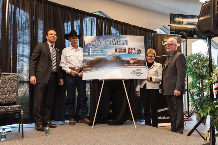 group of people at financial gift announcement