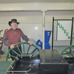 Jack Francis, volunteer curator at the University of Alberta ALES museum, stands with a 1919 buggy, one of his favourite items in the museum.