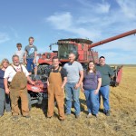 The Banack clan poses with the new hired hand. From left, Allen Kennedy, Terry and Humphrey Banack, Rick Mercer, Nick Banack, Emily and Ken Jackson, with nephews Tim and Daniel Banack at the rear. Photos: