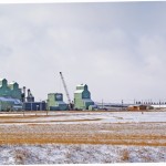 In this Nov. 11 photo, the Alberta Farmers’ Co-operative Elevator Company structure is already down while the top is off of the Alberta Pool Elevator model before
it is ultimately toppled.