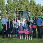 The Stamp clan (from left to right): Richard, Marian, Christine and son Bennett, Nathan, Dynae, Matthew, Aimee, Sarah and son Paul, and Greg. In front are Abigail, Hannah, and Julia.