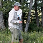 Mark Wonneck, ecologist with Agriculture and Agri-Food Canada,
uses an aerial net to catch some pollinators.