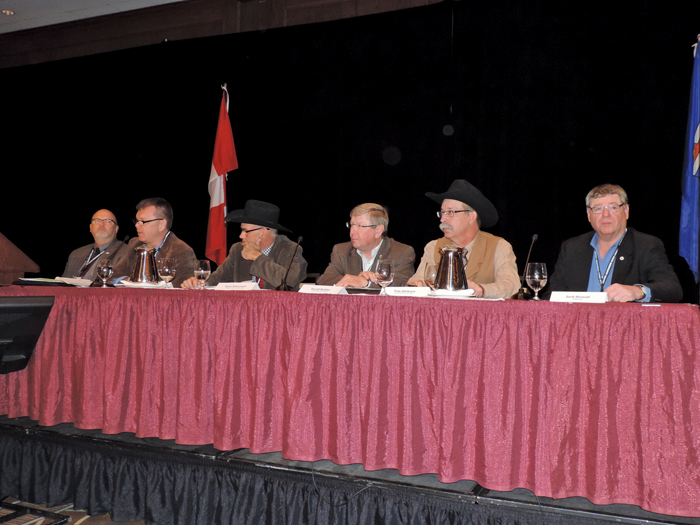 men at a convention table