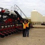 farmers in reflective vests