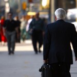 businessman walking in the city