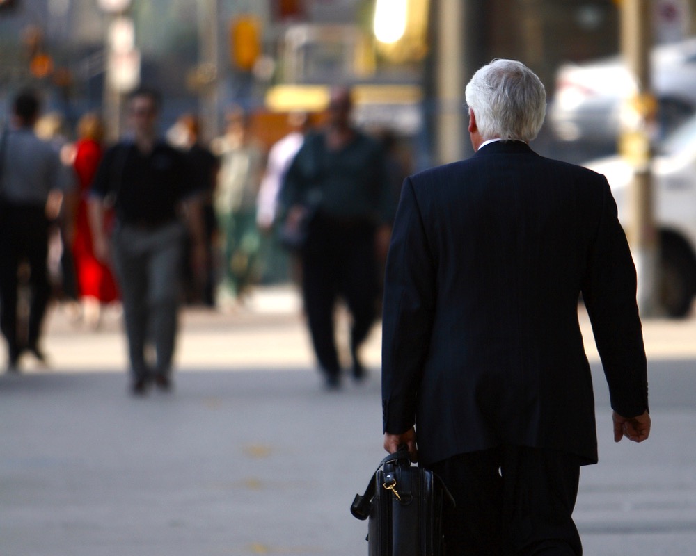 businessman walking in the city