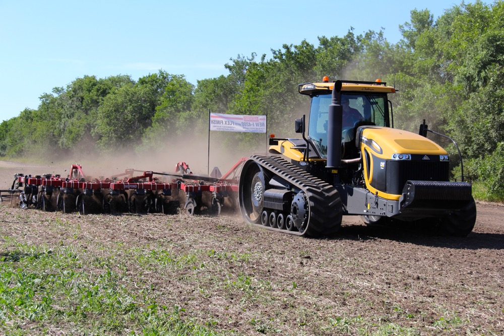 The Ontario-based Salford Equipment kicked off the field demonstrations at the first-ever Ag In Motion farm show near Saskatoon this week, showing how this 30-foot wide vertical tillage tool can be used to work in crop residue and open up the soil. Salford which had its roots in developing tillage equipment for corn and soybean production in Eastern Canada has expanded it’s machinery line over the past 10 years for Western Canadian farming conditions. Vertical tillage equipment is one of their most popular products although the company has also expanded into seeding and fertilizer application systems. With 320 acres of prairie crop land to work with, the Ag In Motion farm show was an excellent venue for many of the major tractor and field equipment manufacturers to demonstrate how their products performed in the field. 