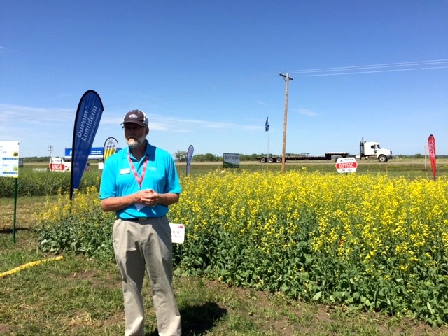 DuPont's says Lumiderm + Vibrance protected 10 per cent of the canola seeded this year. DuPont's Dave Allen shows off the plots at Ag in Motion.