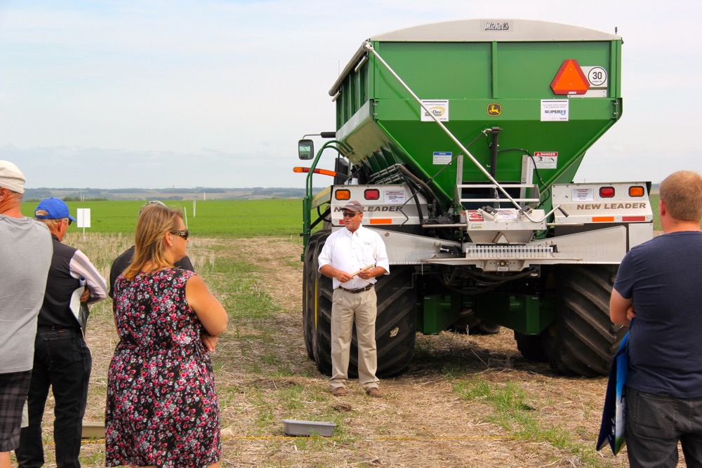 A product rep from New Leader, which demonstrated one of their dry fertilizer spreaders, showed onlookers how the spread patterns of new machines are much more consistent than what the previous generation of spreaders was capable of.