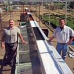 Nick Savidov (left) and Marc Legault used a bioreactor to convert poultry manure to fertilizer in three weeks.
