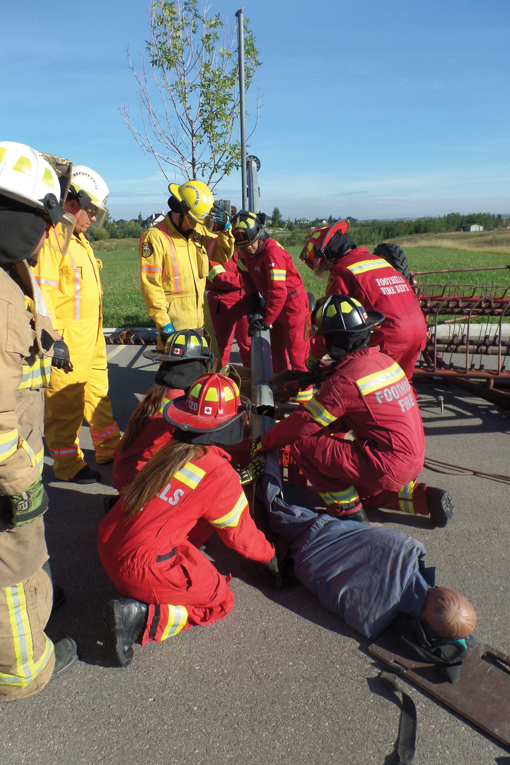 In this training simulation, emergency responders first cut open a portion of a grain auger to assess how badly the ‘victim’ is injured and then cut the auger to free its leg.