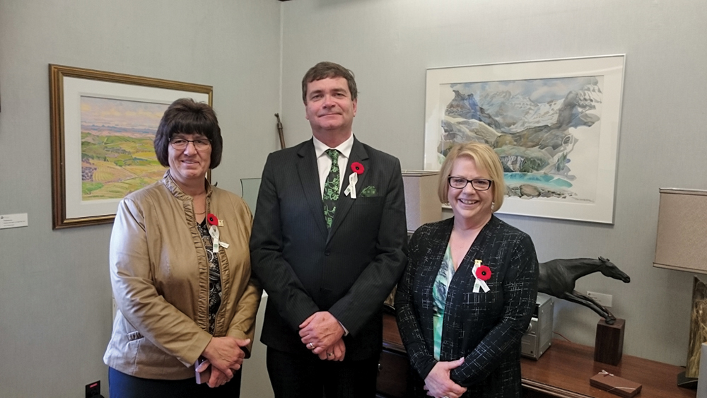 Dorothy Carlson (left) and Sherry Howey with Agriculture and Forestry Minister Oneil Carlier after being inducted into Alberta’s 4-H Hall of Fame.