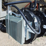 Airguard’s Blockage Prevention System takes the hydraulic oil in the tractor and recirculates it in a radiator to regulate air temperature and reduce relative humidity, preventing fertilizer dust from building up and plugging lines.