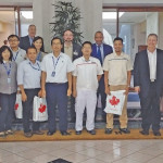 Greg Porozni (back left) with Team Canada mission members and Canadian wheat customers in Jakarta. The whirlwind trip through Asia was an eye-opener, says the Willingdon producer.