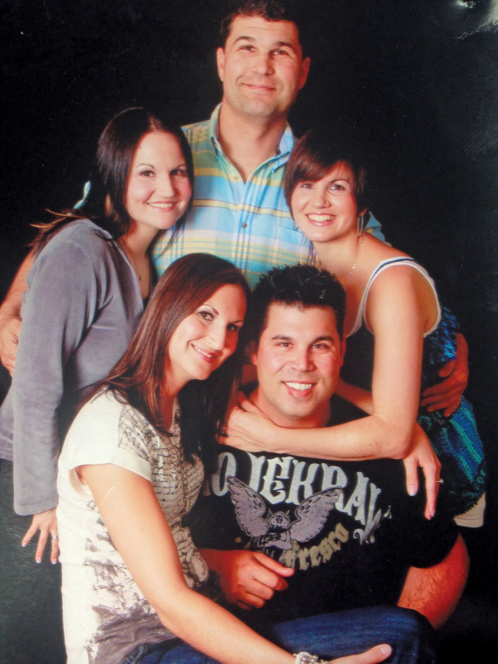 Monique and Patrick Racine (front) with the siblings (standing from left to right) Joanne, Marc and Roxanne. Monique and Patrick came close to suffocating in a grain truck when they were young.