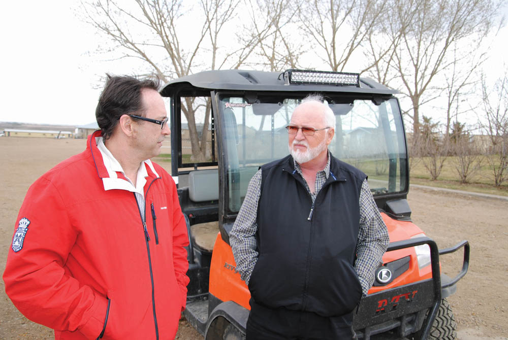Safety expert Don Andrechek (l) is working with Paul Wipf of the Viking Colony to develop  a safety program specifically for Hutterite colonies.
