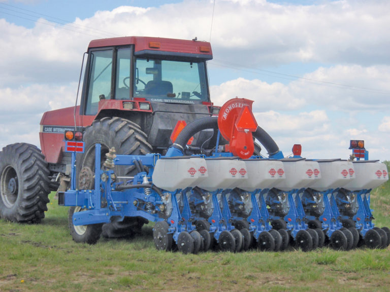 Costly corn planter gives ultraconsistent canola stands Alberta