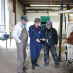 Joyce Van Donkersgoed demonstrates processing techniques to students from Olds College.