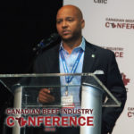 There was thunderous applause when Cameron Bruett said Canada leads the world in the effort to produce sustainable beef, but the JBS official also said the beef sector still faces many challenges.