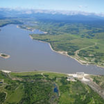 Water levels behind the Ghost Dam, shown here during spring run-off, are being kept lower from mid-May through early July to provide flood protection.