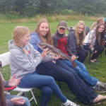 Yes b’y, that’s a real live cod that Brooke Hammond was working up the courage to kiss when she and her fellow 4-H’ers were ‘screeched in’ upon their arrival in Newfoundland.