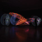 This photo captures two of the 11 projects offered by the Golden Prairie 4-H Club — busking and photography. In this busking performance at a local church last year, club members use glow Hula Hoops for a poi performance. (Poi is an art form created by the Maori people of New Zealand and involves making rhythmical and geometric patterns by swinging tethered weights). The performance was captured by members of the club’s photography project.