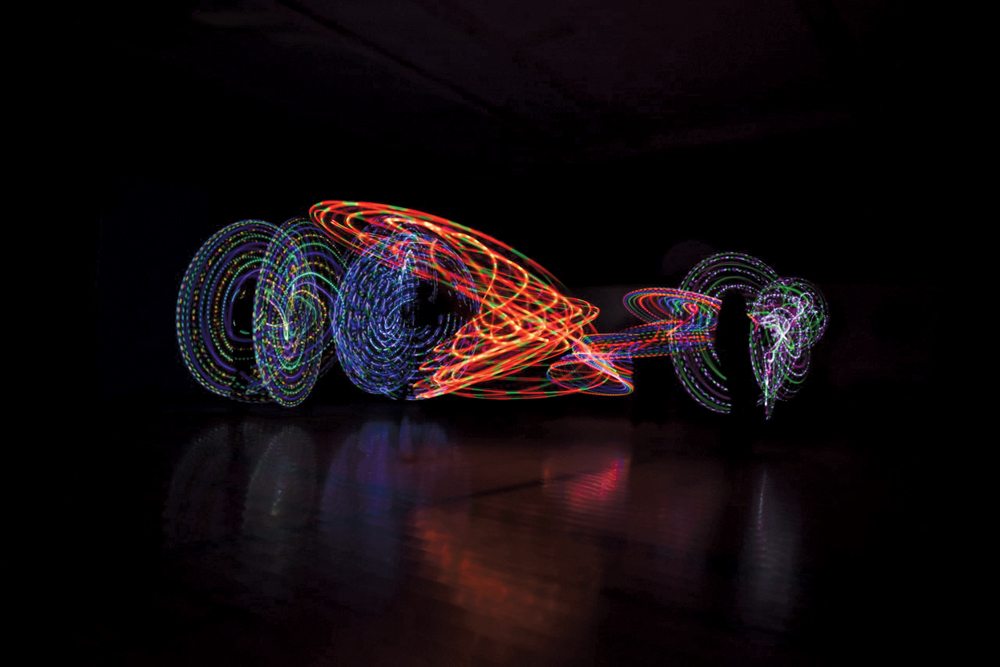 The Golden Circle 4-H Club uses glow-in-the-dark Hula Hoops for a poi performance.