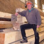 Will Vohs has sawmilled timbers as large as 12x12 inch from his woodlot. Rather than converting all his land to pasture, he kept a half section as a woodlot, and is now reaping the benefits of an extra income by sawing custom wood products.