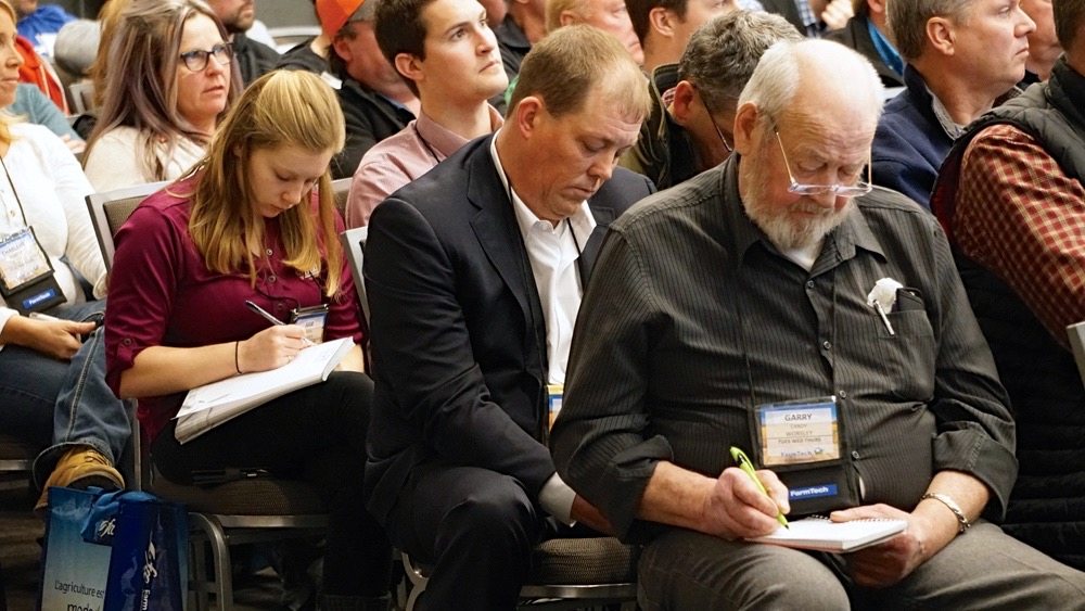 Attendees furiously taking notes is a common sight at FarmTech, including at this session on soil health practices given by USDA conservation specialist Jay Fuhrer. He was one of nearly 50 presenters at the annual conference. FarmTech consistently sells out, with 2,000 people taking in this year’s event.