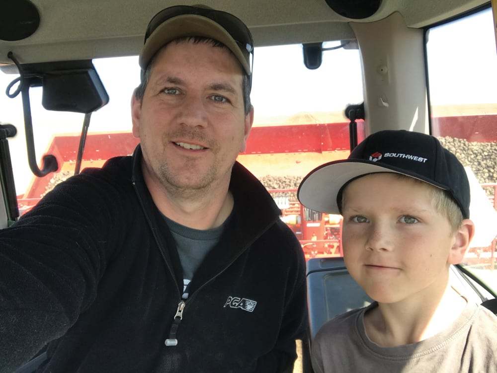 Michel Camps, with son Nick, eight, says opportunities are opening up for new entrants to potato production.