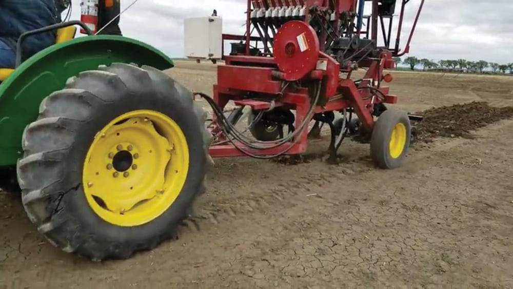 Farming Smarter deep banded immobile nutrients at a depth of six inches using a seed drill with a basic stealth opener system.