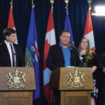 Too much progress has been made on workplace safety rules to go back to square one, says AgCoalition chair Albert Kamps,
seen here at a news conference with Labour Minister Christina Gray.