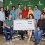 Accompanied by her grandson Spencer Boles (front row, far left), Judy Sweet (front row, second from the left) presents her donation to Josie Van Lent, dean of Lakeland’s School of Agricultural Sciences, and Geoff Brown, associate dean. In the rear (from left to right) are: Ethan Winsnes (sheep unit manager), Hannah Olsen (students’ association president), Brantley Wasmuth (crops assistant manager), Connor English (research unit manager), Jonathan Lange (dairy unit manager), Colton Nickipelo (general manager), Jarrett Hargrave (purebred beef unit manager), and Erica Horner (commercial beef unit manager).