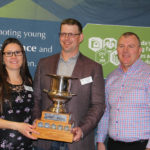 Natasha Pospisil and Dallas Vert, alongside judge Tom Terrill of CIBC, are this year’s
Alberta Outstanding Young Farmers.