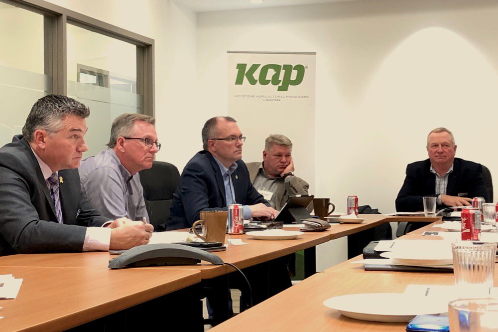 Manitoba Conservative MP James Bezan (l) and ag and trade critics Luc Berthold and Randy Hoback (centre) meet with farm and canola sector representatives including Keystone Agricultural Producers president Bill Campbell (right) and canola grower Brian Chorney (second from left) on April 24, 2019. (Dave Bedard photo)
