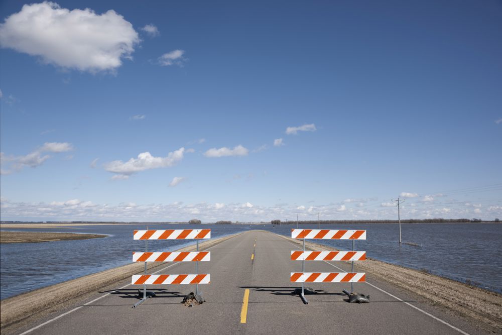 File photo of a flooded North Dakota highway. (DLerick/E+/Getty Images)
