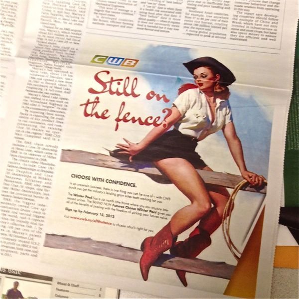 Reactions range from amusement to offense over a new retro-style CWB ad for its Winter and Futures Choice Winter pools, appearing now on CWB’s website and shown here in the Jan. 17 Manitoba Co-operator. ”What an image of a long-legged woman straddling a fence has to do with selling grain is beyond me,” National Farmers Union women’s president Joan Brady said in a release Friday, calling the ad ”offensive, and likely to cause farmers to market their grain elsewhere.”

